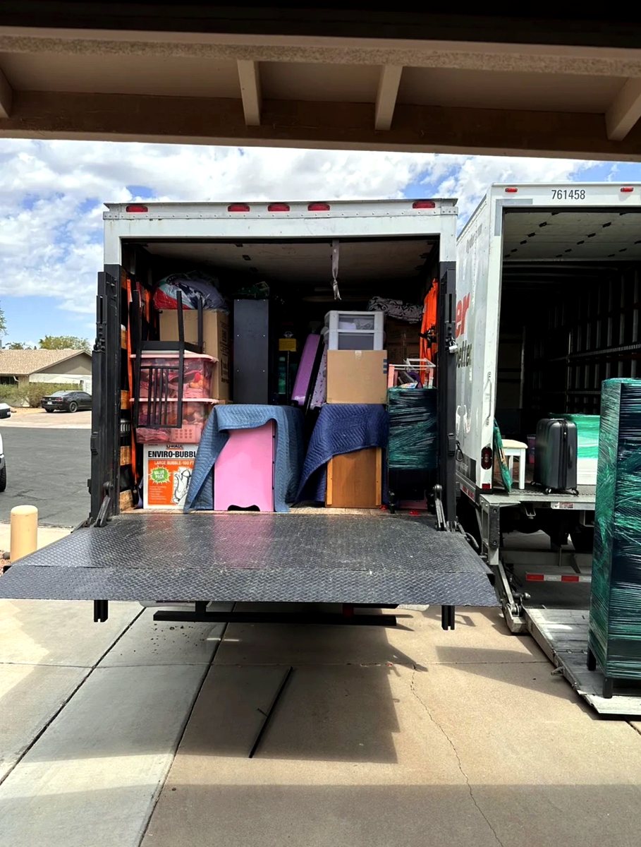 Box truck with liftgate loaded with protected furniture